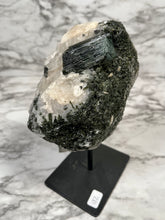 Load image into Gallery viewer, LARGE GREEN TOURMALINE IN MATRIX ON A STAND
